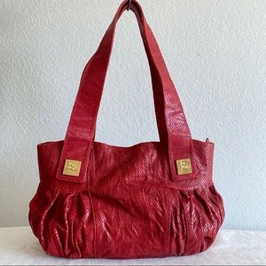 Jenrigo red python snakeskin bag